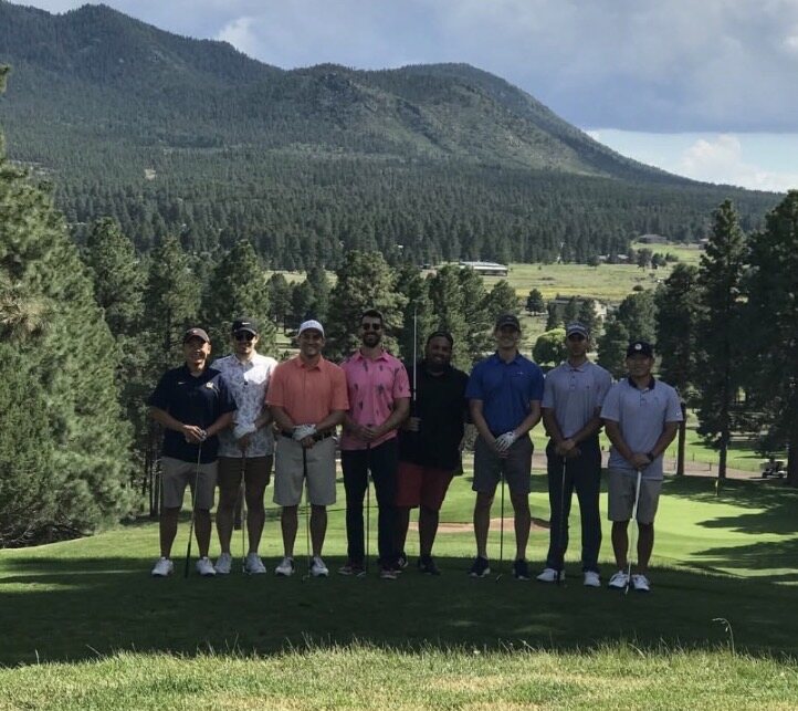 On the green. Mountain country. Eight on the tee box.